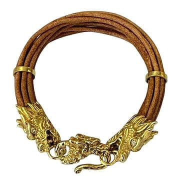 PULSEIRA COURO CASTANHO COM DRAGÕES DE PRATA DOURADA