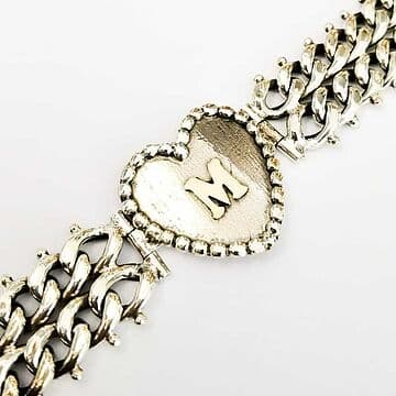 PULSEIRA EM PRATA 925, DE BARBELA DUPLA COM CORAÇÃO E LETRA EM OURO.